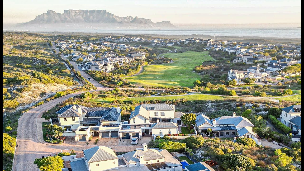 Entertainer home next to the 8th hole on Atlantic Beach Estate, Cape Town. Agent is Morris Pieterse