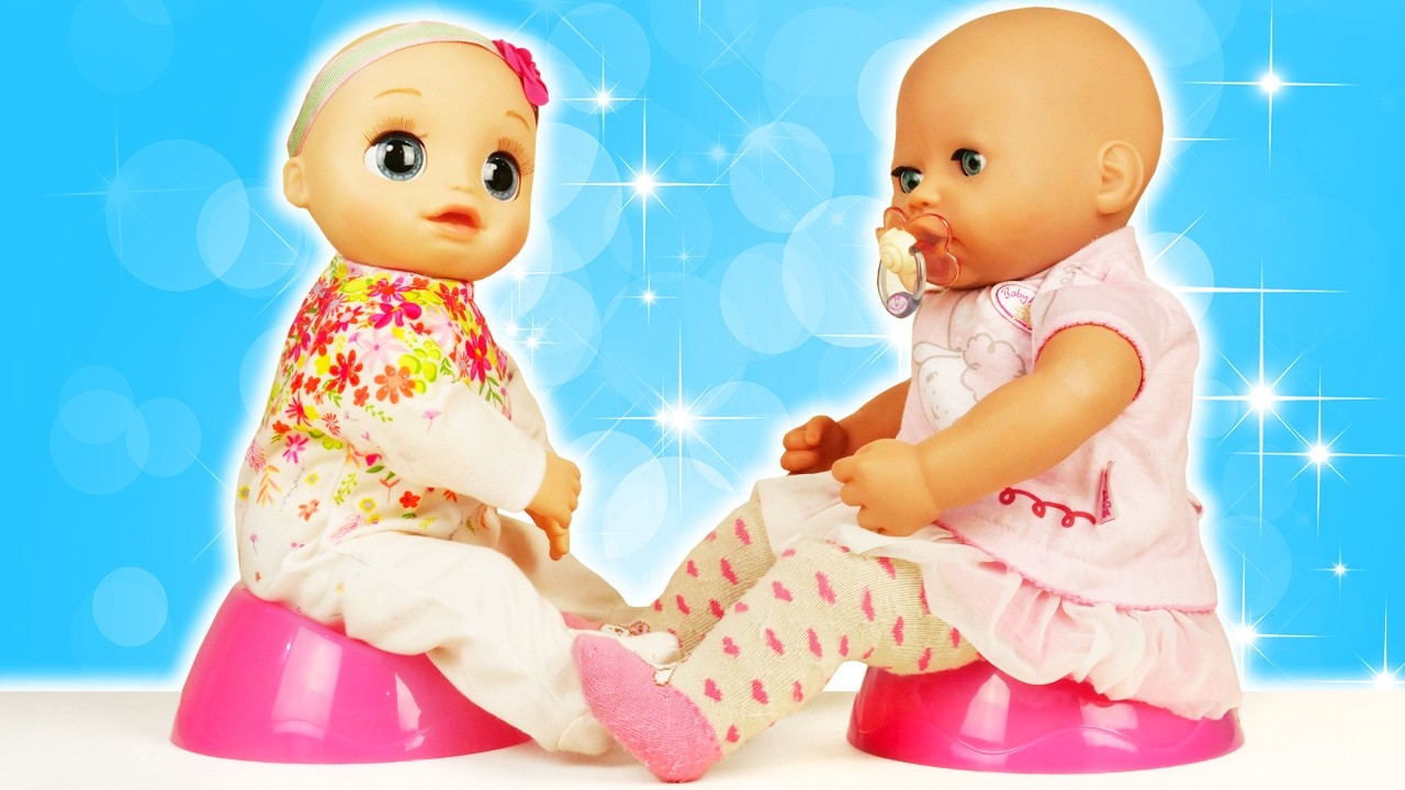 A Baby Alive doll came to visit her Baby Annabell doll, and they play together.