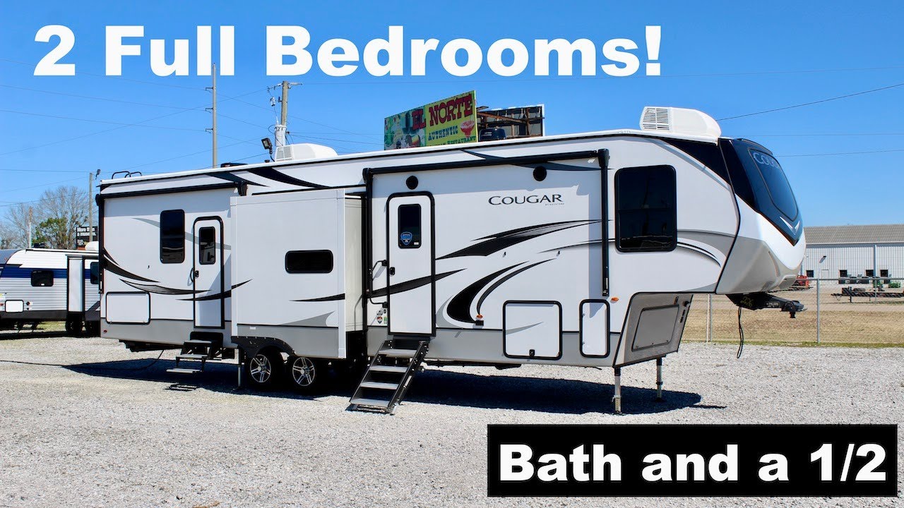 There's something AMAZING about this 2 Full Bedroom Camper! Keystone Cougar 364BHL