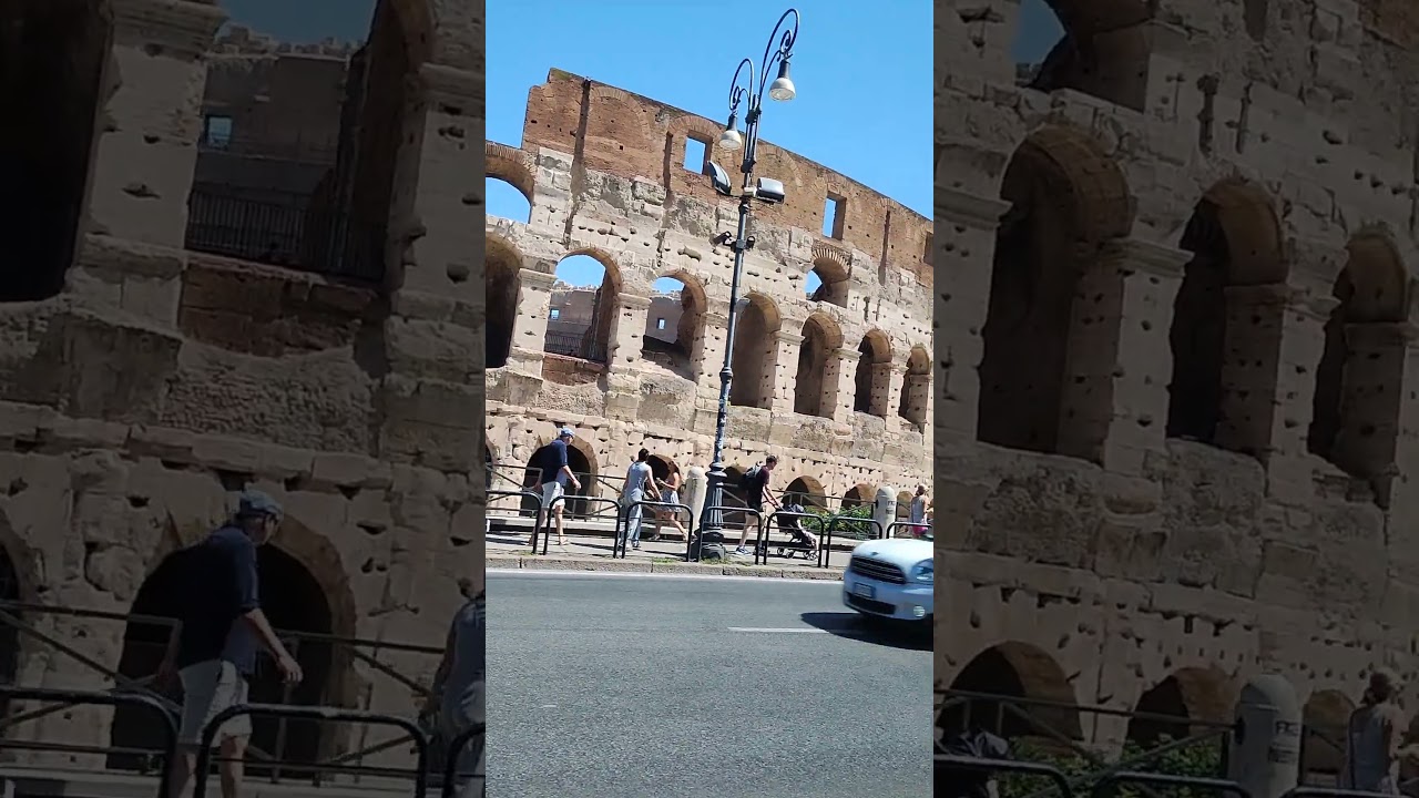 driving by the Colosseum, Italy