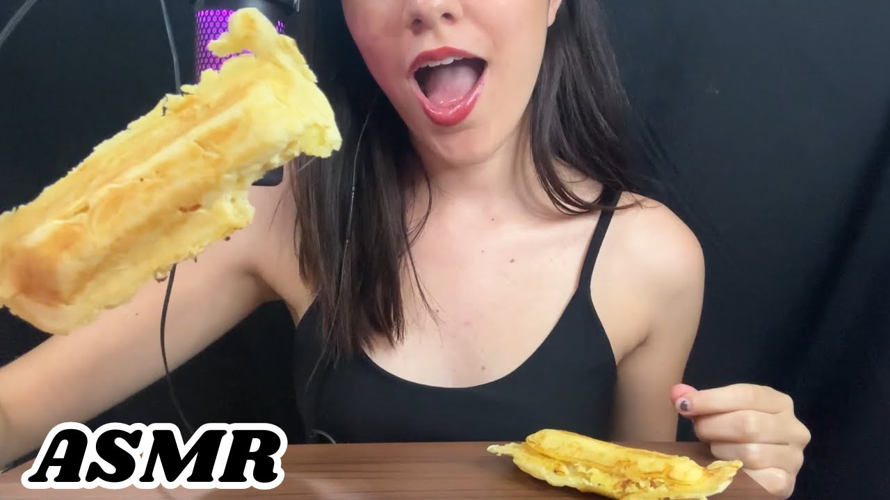 Eating Swiss crepe with ham and cheese and chicken