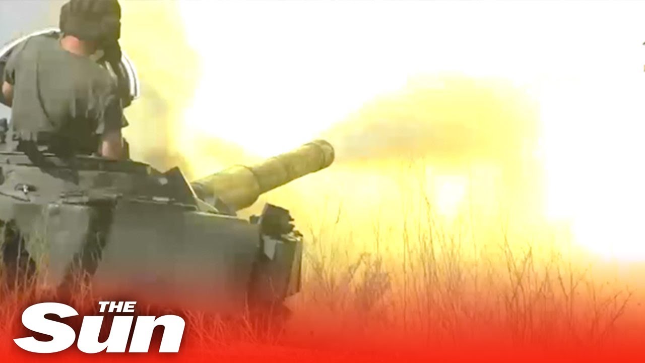 Pro-Russian troops tear through Donetsk with armoured tanks