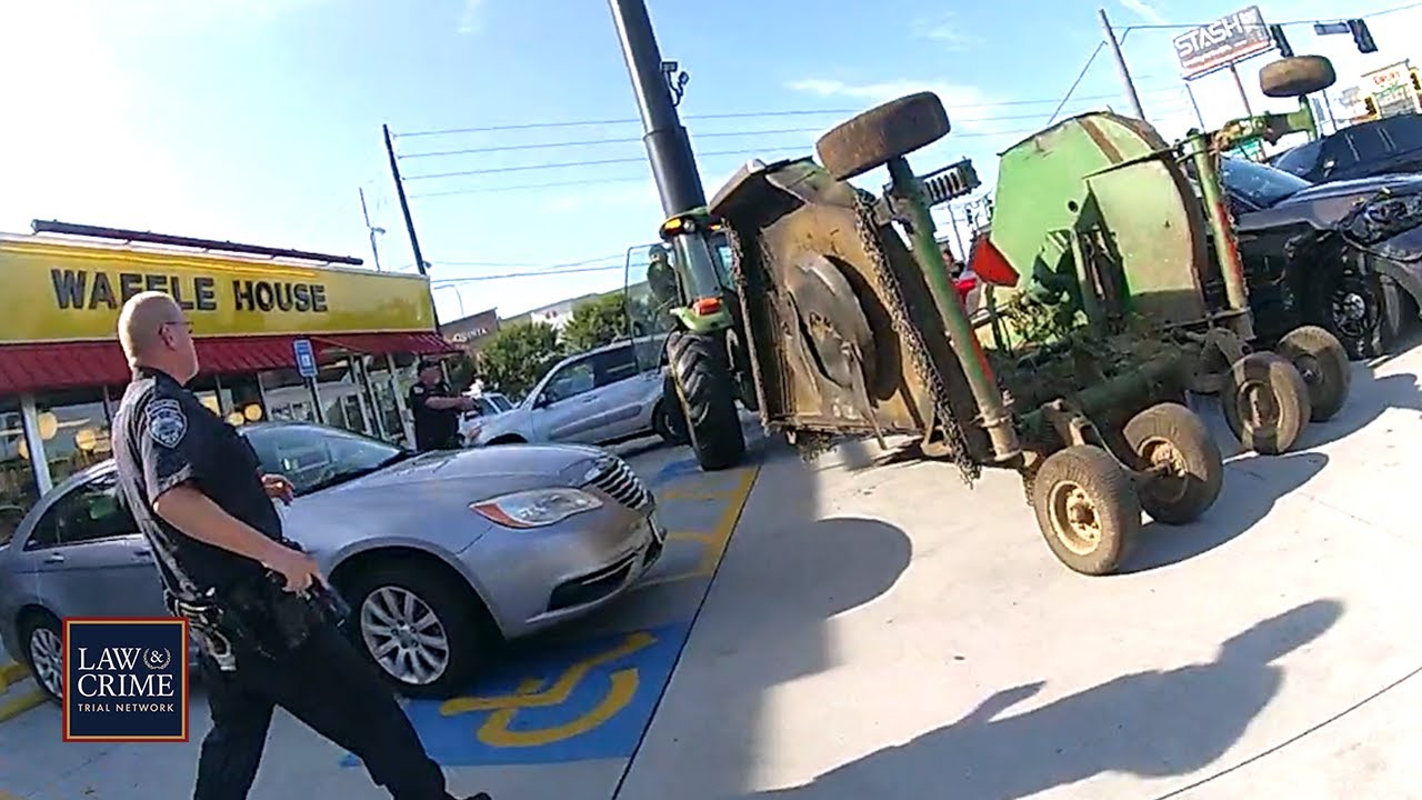 Bodycam: Suspect Driving Stolen Tractor Rams Cop Car in Waffle House Parking Lot