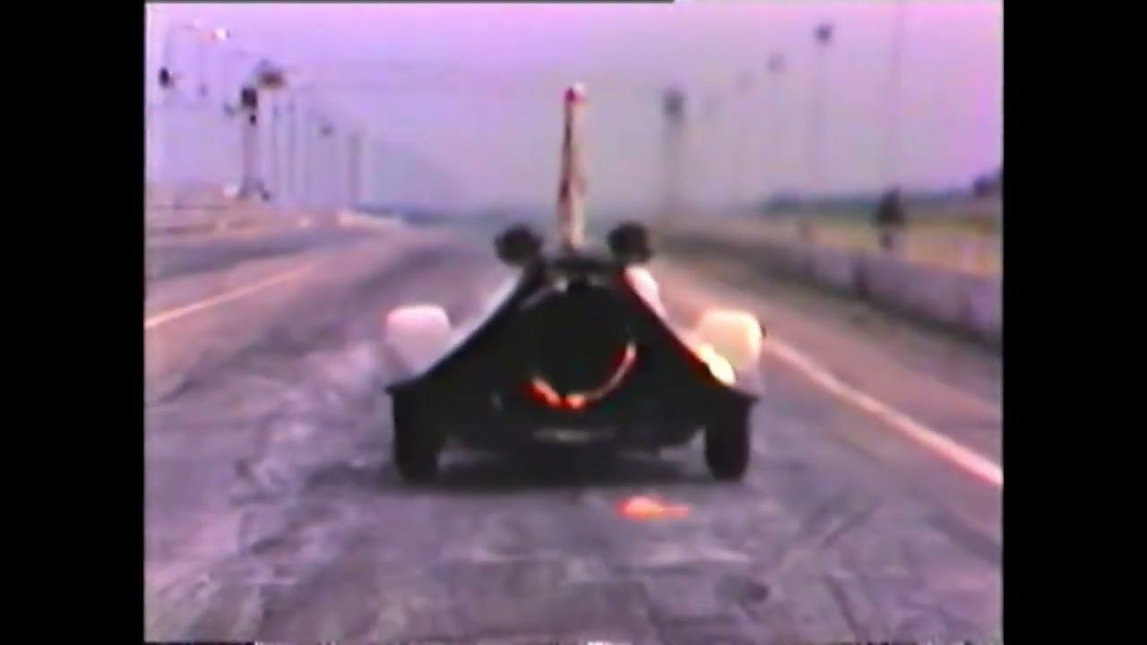 Santa Pod:  Top Fuel Funny Car Vs Jet Car - Scorpion -  from the Barn - July 1981