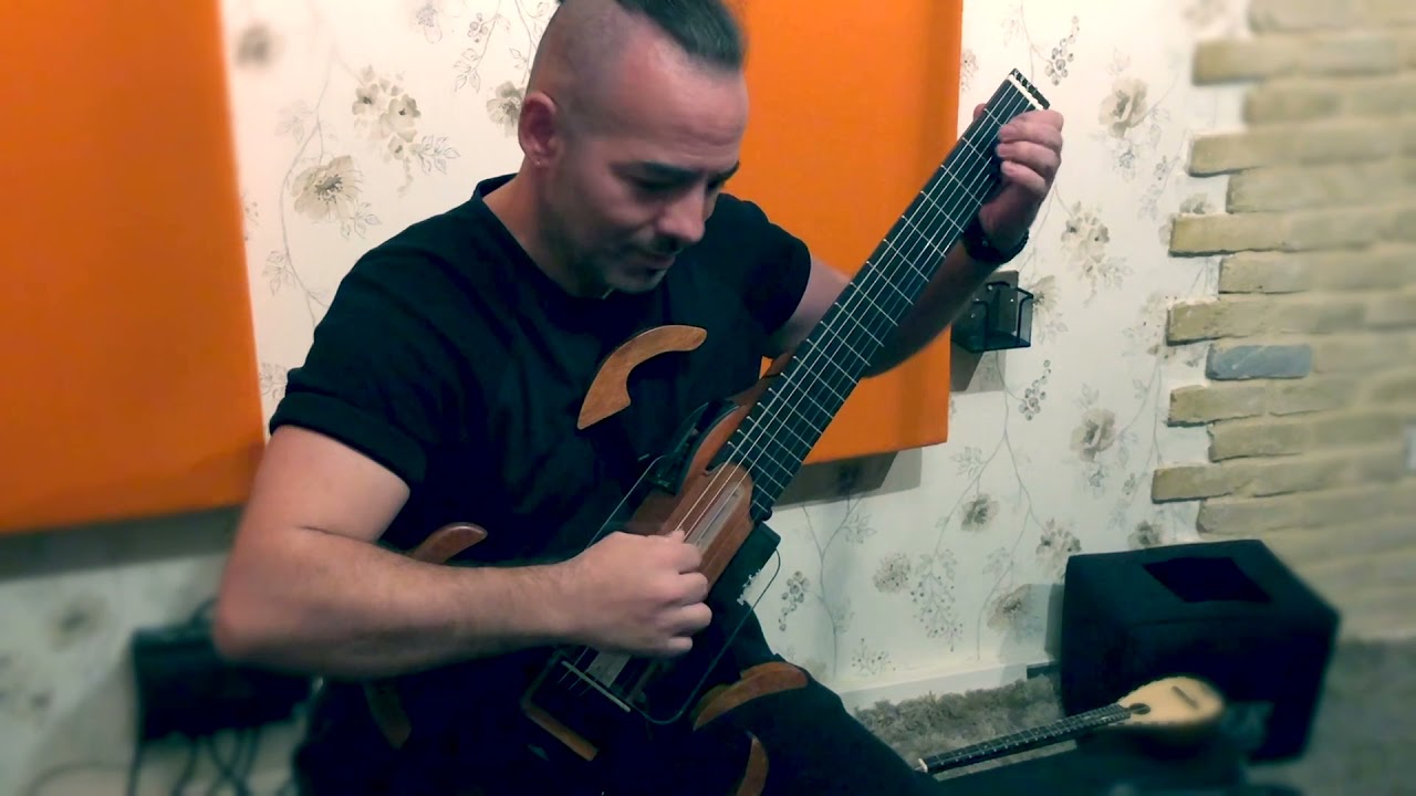 Pantelis Ntzialas performing on the MOOV Travel Guitar a joyful Brazilian tune
