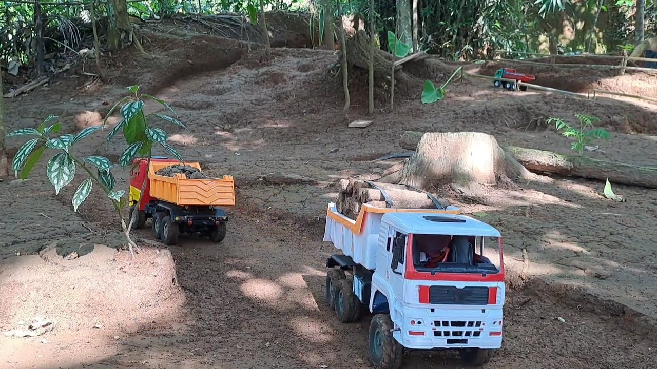 Truk Man Putih Muat Kayu Truk Man Orange Muat Batu