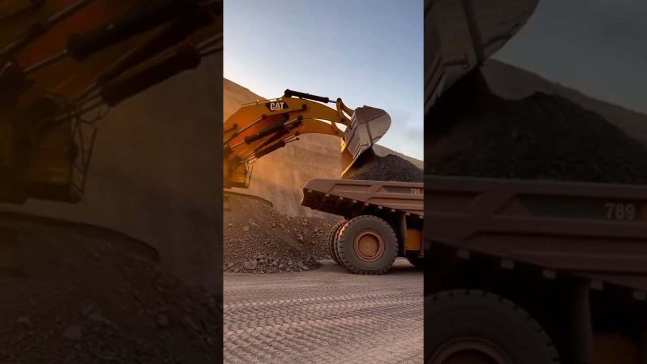 Dump Truck Loading Ore at Mining Site