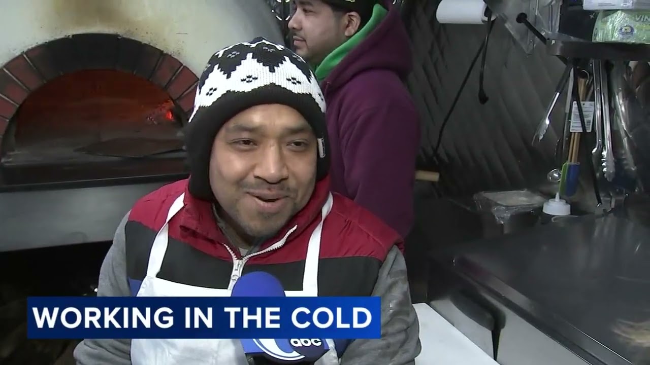 Outdoor workers in Philadelphia brave the bitter cold