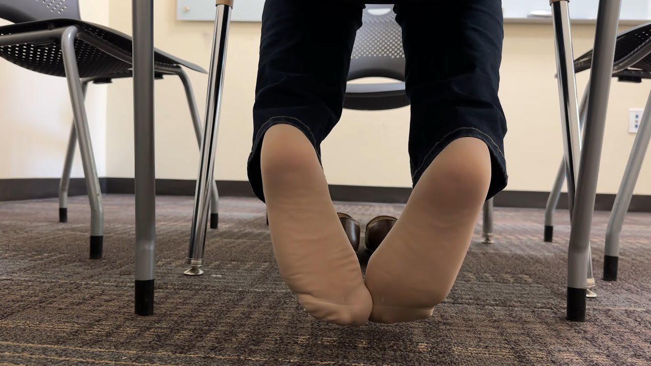 Brown Loafer Shoeplay With Nylon Stockings Under The Table
