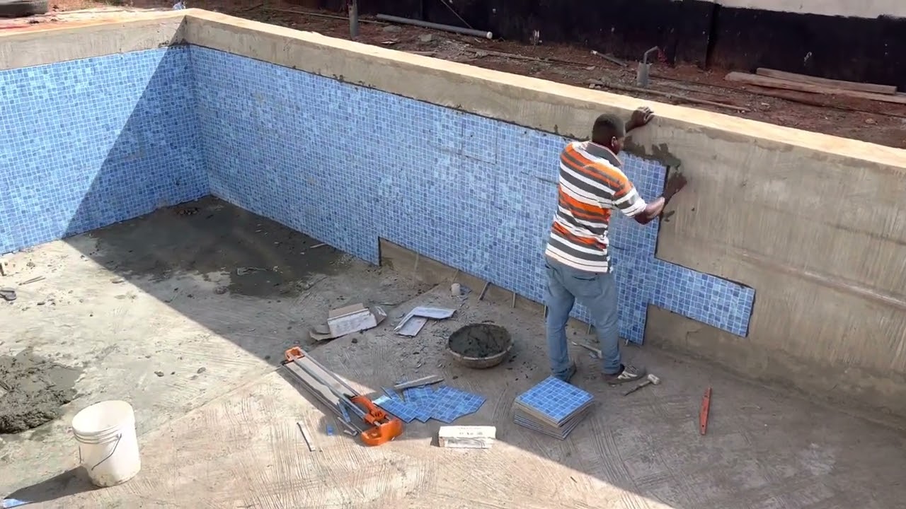 Building in Ghana | Swimming Pool Tiling Update | It’s getting Expensive 🙄🙄