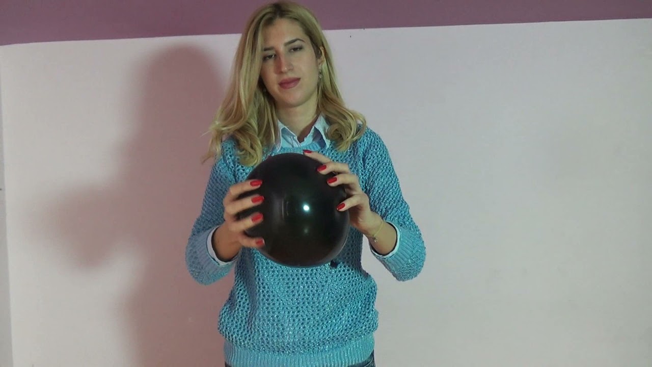 Barbara and Dulce pop balloons