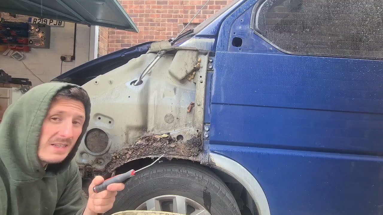 Uncovering Years of Dirt and Grime Lurking Behind Body Panels. Volkswagen T4 Wing Removal.