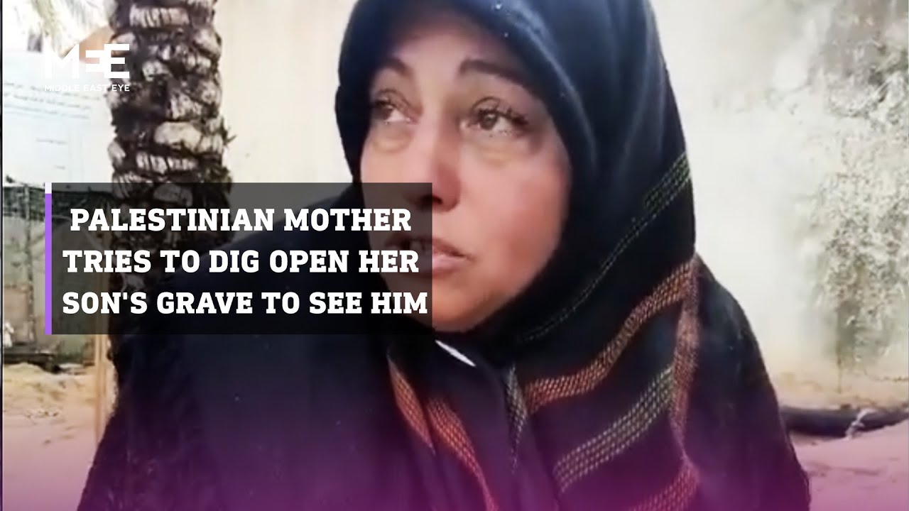 Palestinian mother tries to dig open her son’s grave to see him