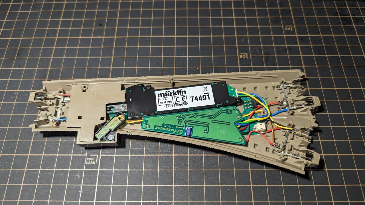 Installing Viessmann 5231 decoder and a Marklin 74491 electric drive on a Trix switching point