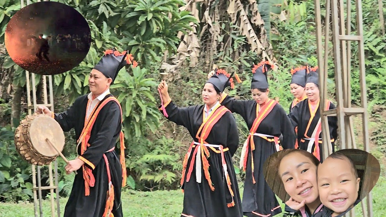 Single mother takes her child to see the Dao ethnic group's cultural festival.