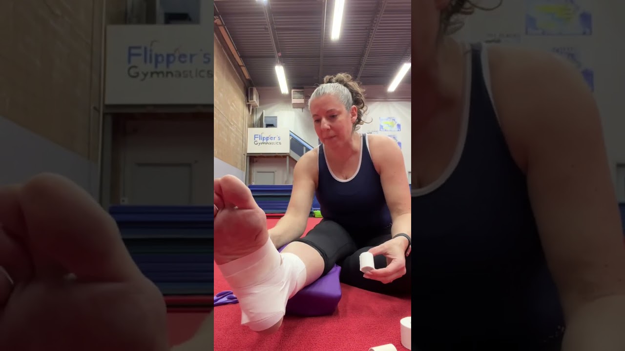 Taping my ankle before my #gymnastics workout 5 months after #achillesrupture.