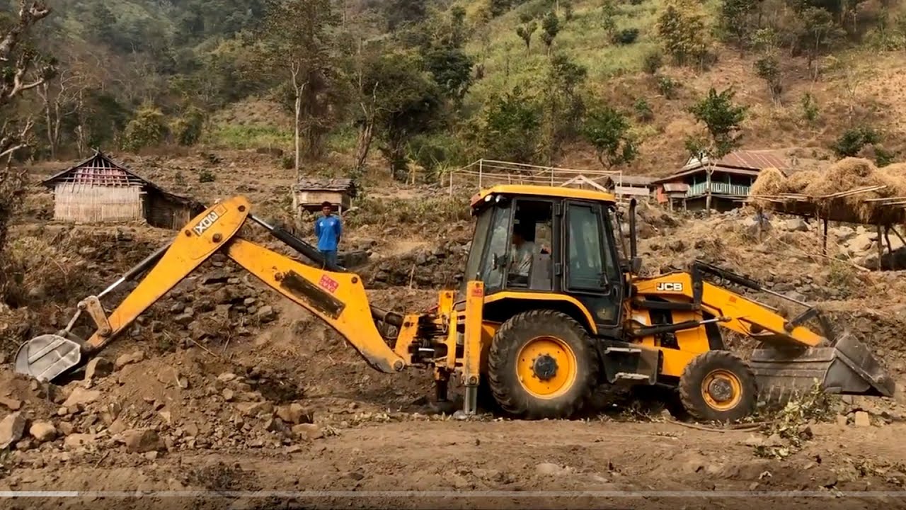 JCB Backhoe 3DX Machine Working Hill Land - JCB Pulling Out Stones Hilly Field
