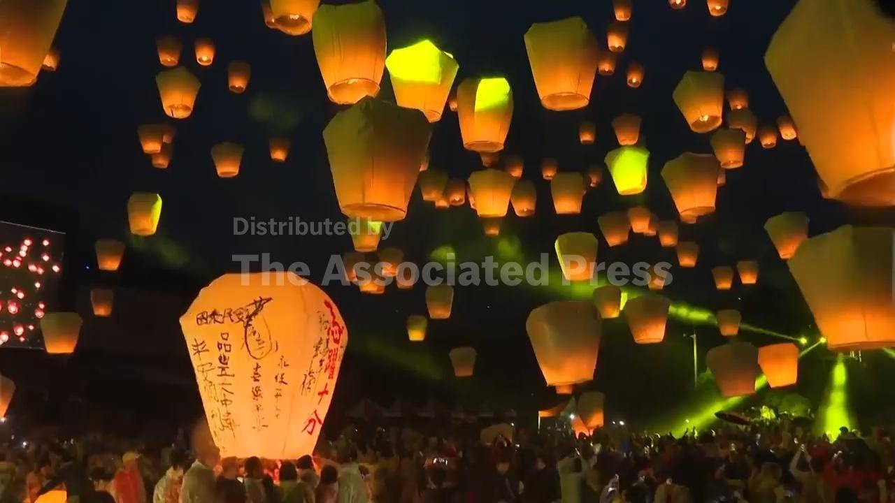 Taiwan's sky lantern festival visitors hope for more peaceful future