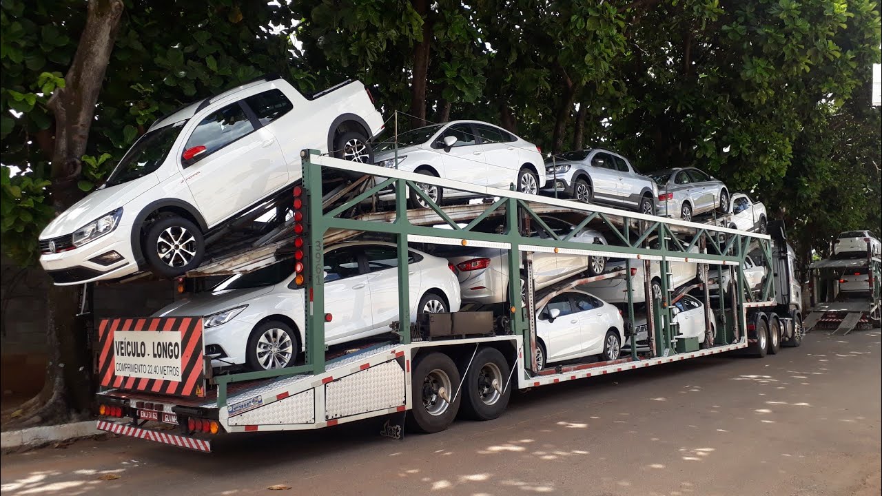 Descarregando carreta cegonha só carros grande