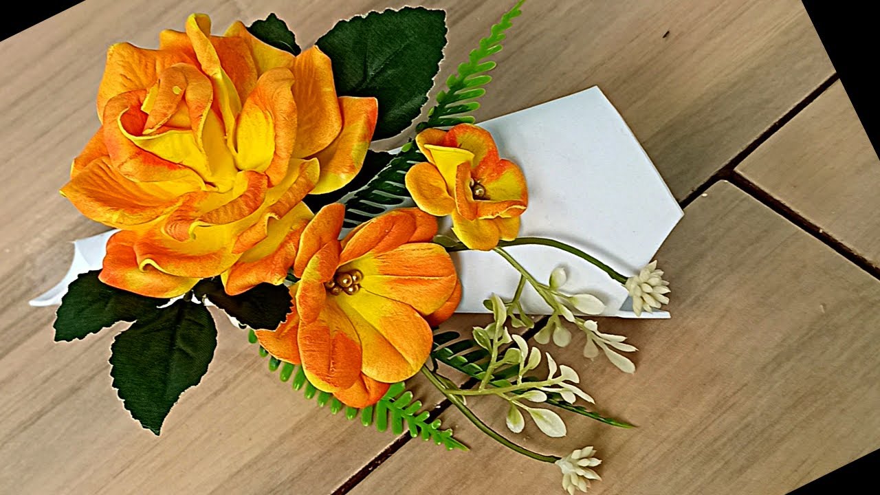 Porta guardanapos  com flores de eva para festas de final de ano. Natal e ano novo