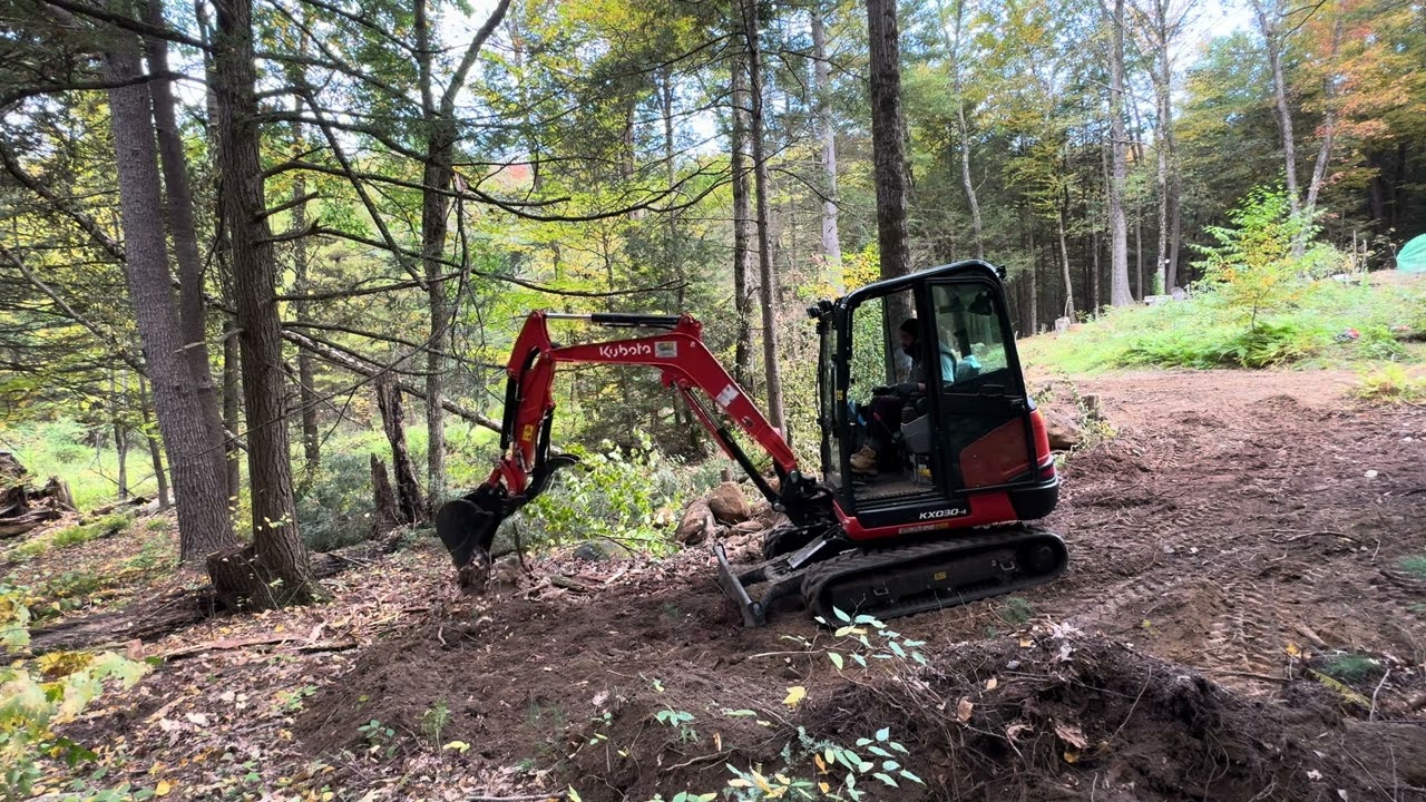 Clearing land with our  Kubota KX030-4 
