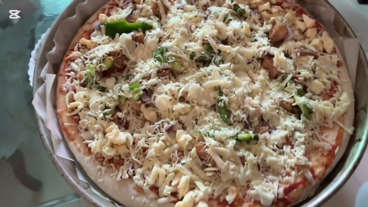 Chicken  tikka pizza by the little chef