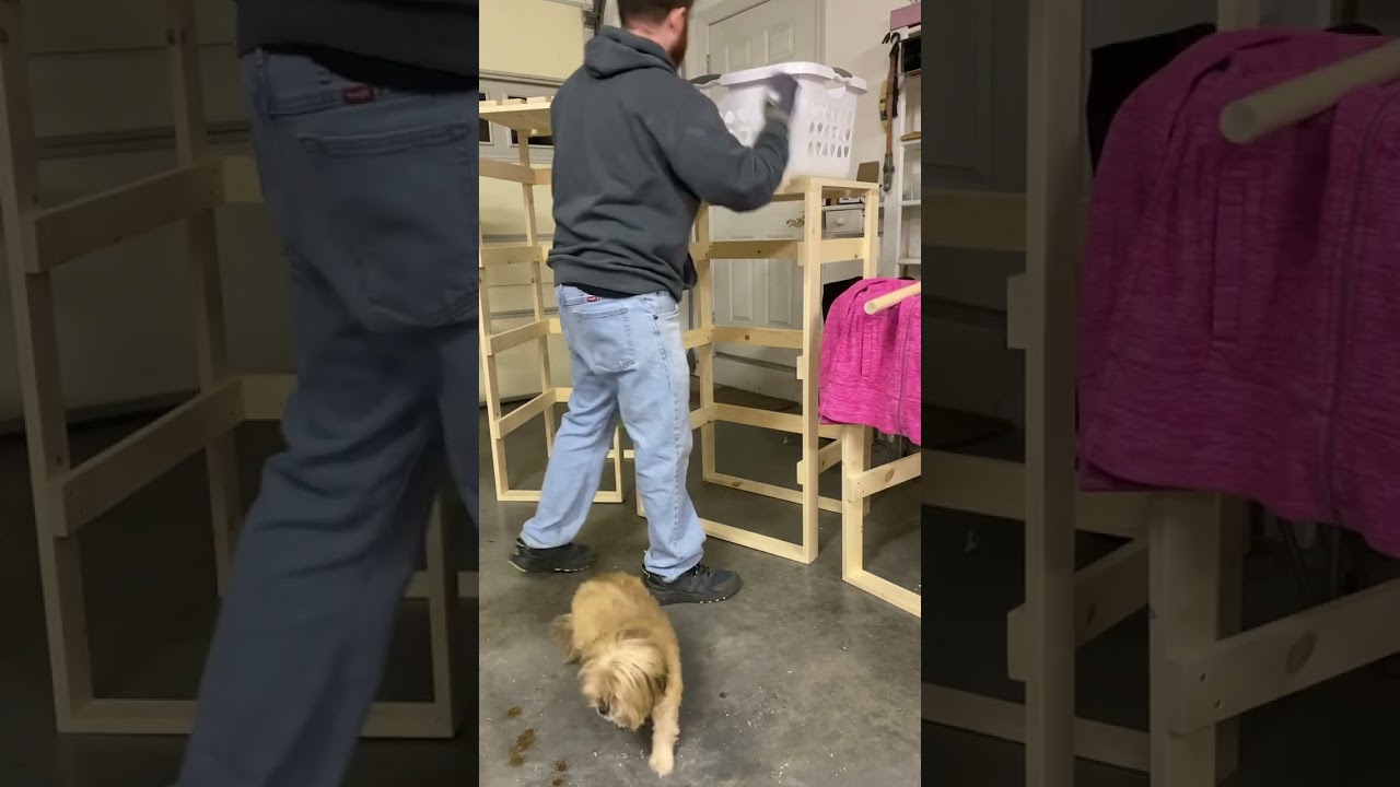 Testing out our laundry basket portable closet!