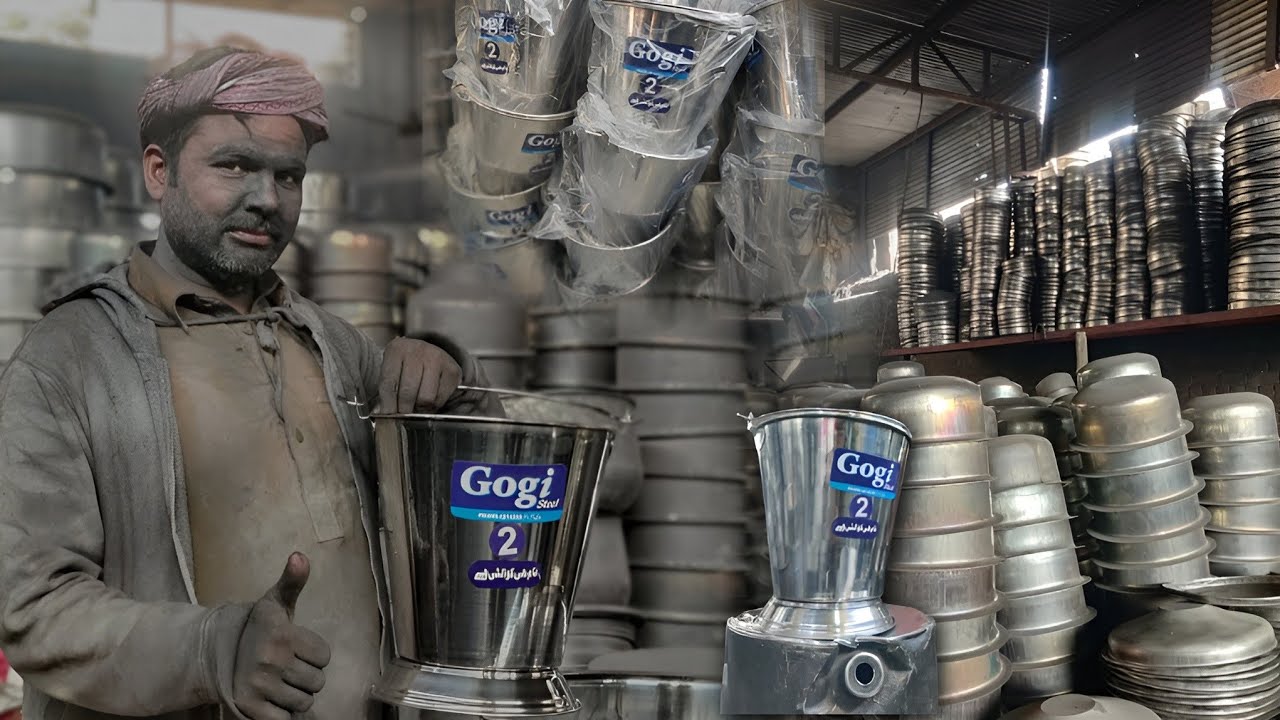 How is mass production done by workers in a steel bucket factory?