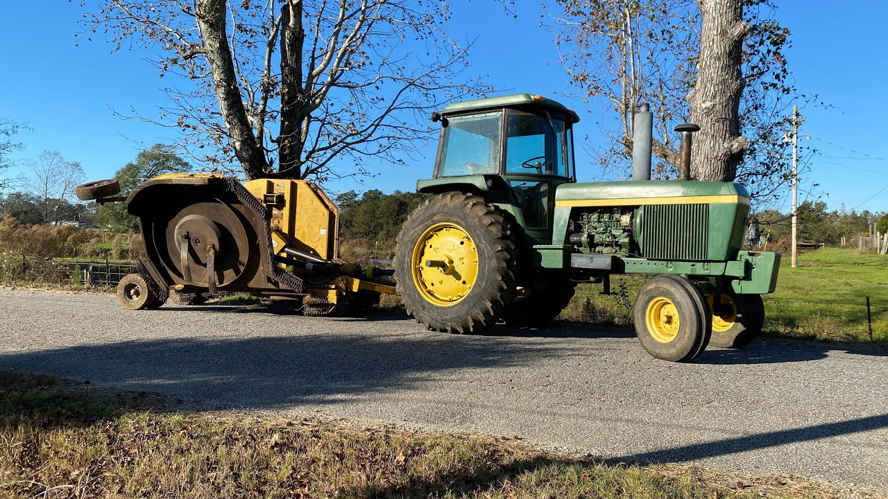 Bush hogging with a John Deere 4430