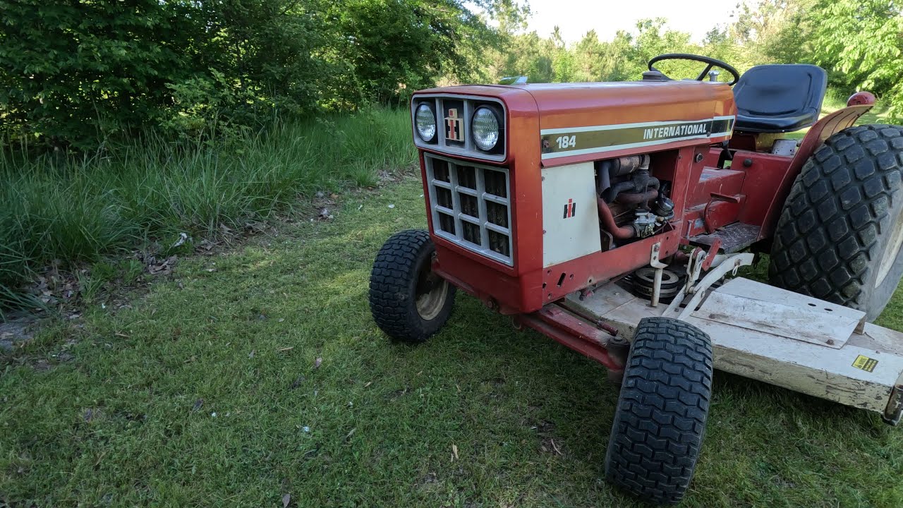 Old International 184 Mowing