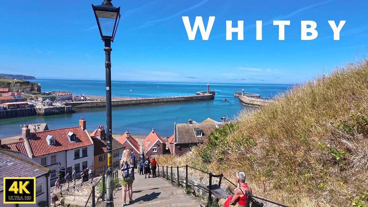 🇬🇧 Seaside port Whitby's old town, pier & beach under summer heatwave on East Coast of Yorkshire
