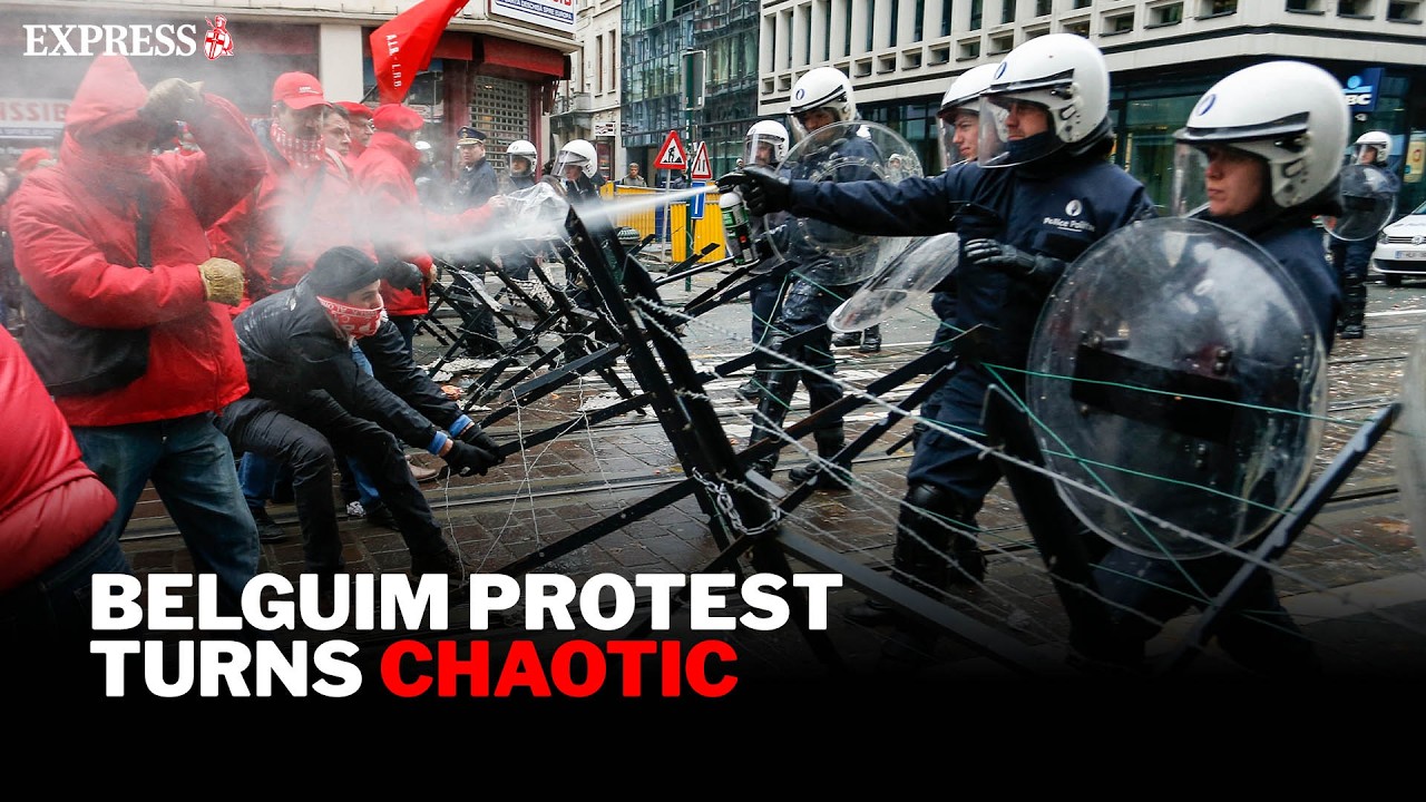 CHAOS in Belgium as protesters clash with riot police during strike march