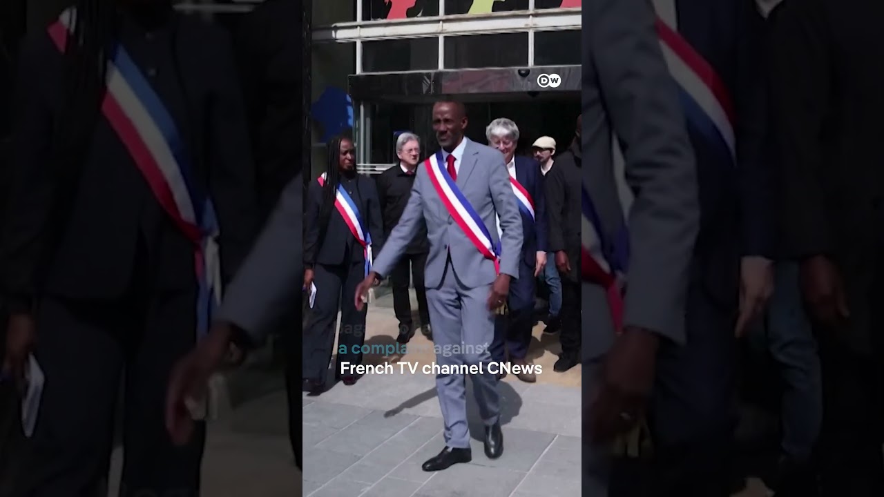 Thousands rally against racism to support Black mayor | DW News