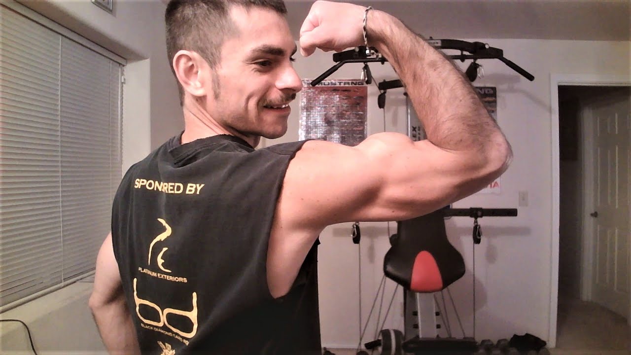 Flexing my huge, peaked biceps!
