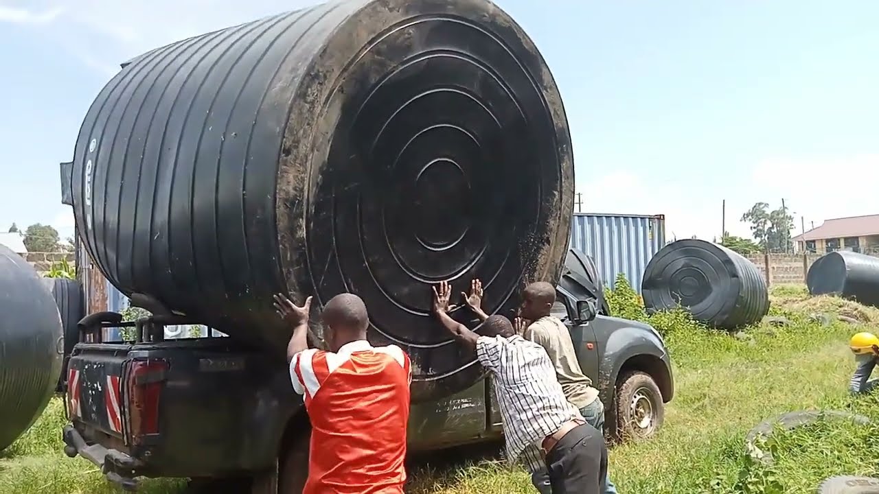 How they loaded a 10,000 litres ROTO tank onto a pick up, from Jumbo Tank Stores, Migori - Kenya.