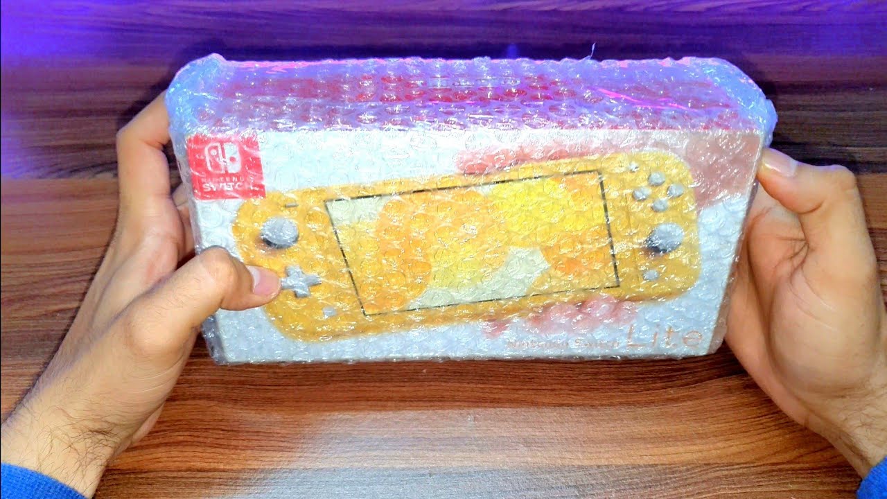 Nintendo Switch Lite Unboxing in 2022 (Impression and Quick Setup)