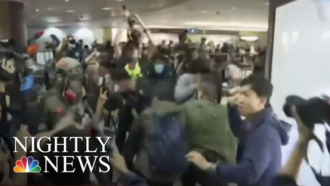 Demonstrators Stage Anti-Government Christmas Eve Protests In Hong Kong | NBC Nightly News