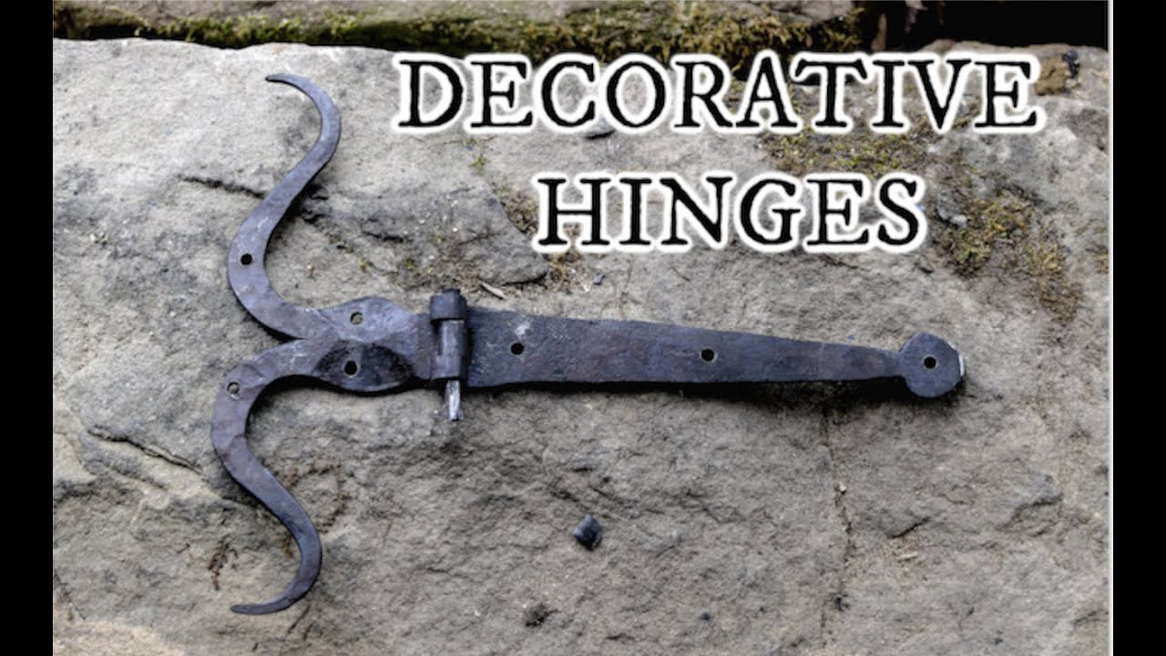 Forging decorative hinges for our blacksmith shop