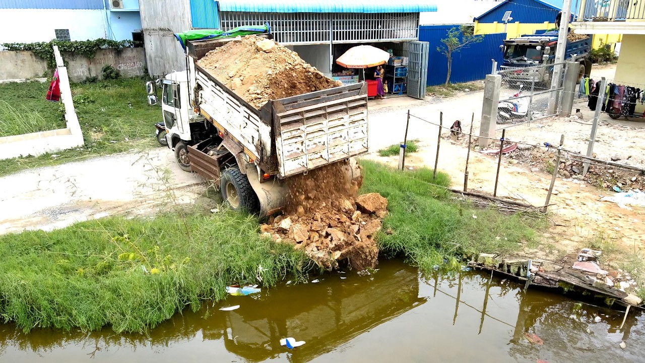 Completed the work of pouring rocks into a flooded area and grass area using heavy machinery