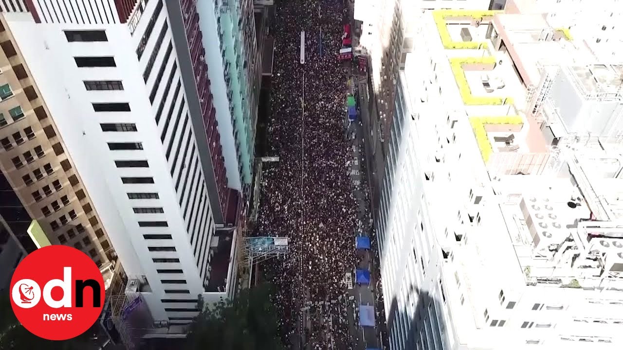 Hong Kong protest: Aerial drone shots show thousands marching