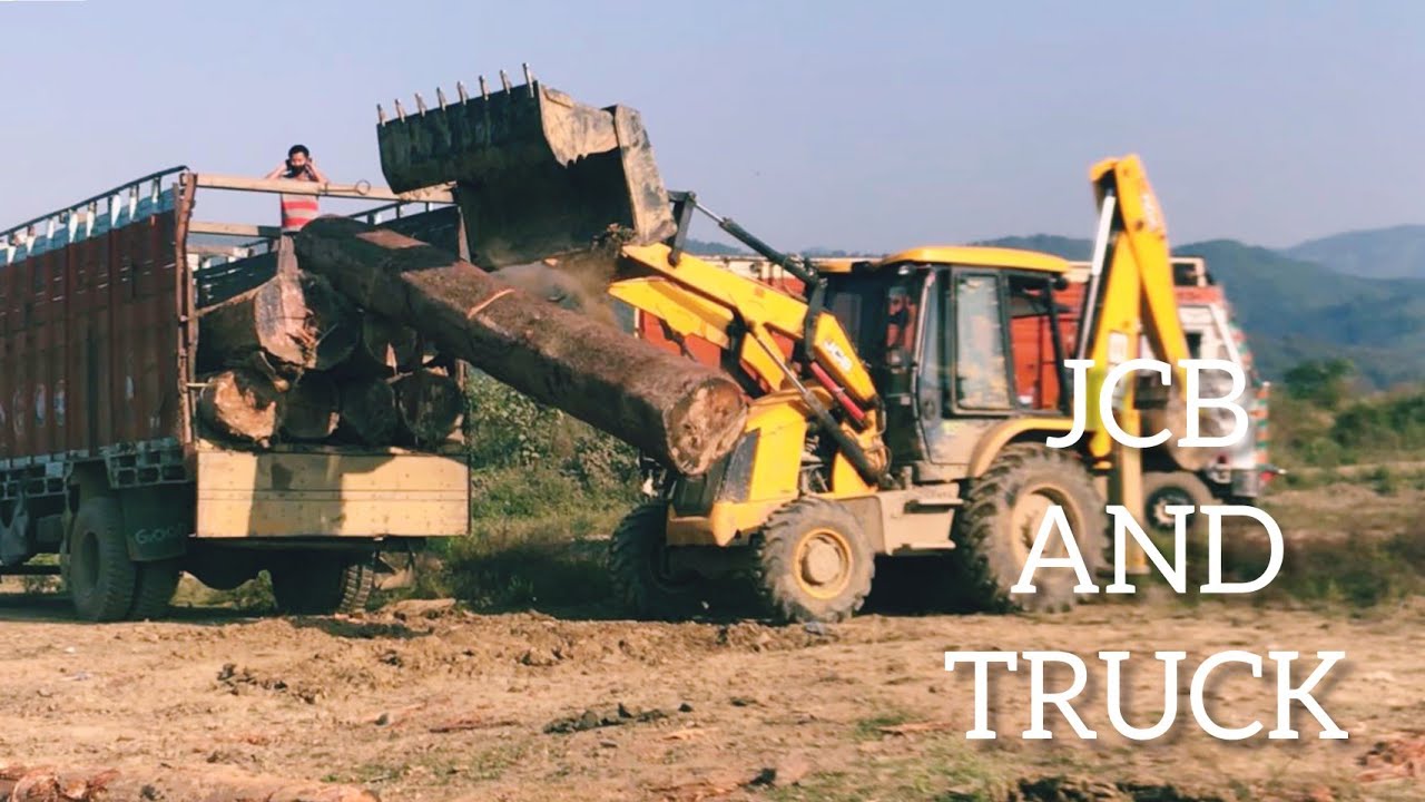 JCB 3DX SUPER LOADING TIMBER TO A TRUCK 1613C