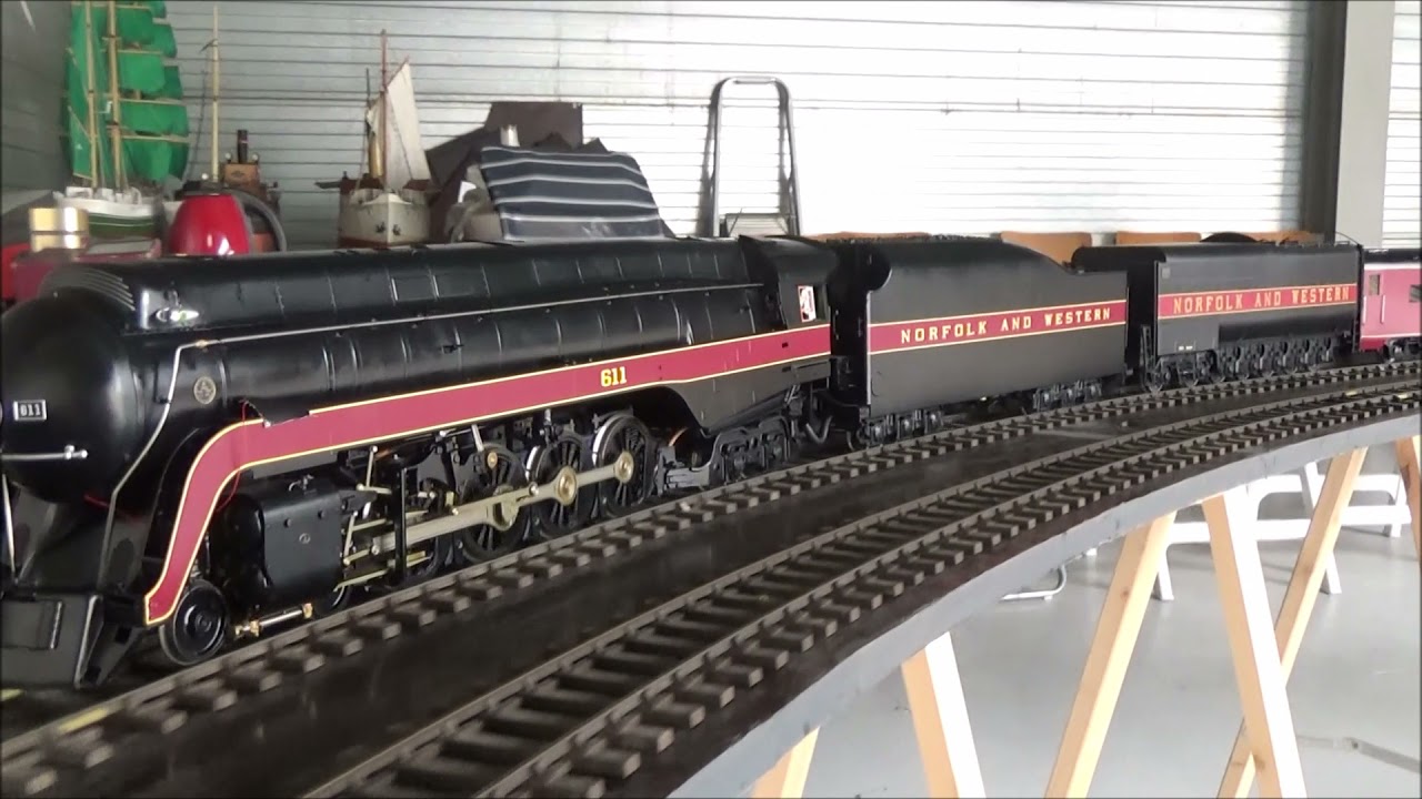 Norfolk and western J class 611 united with its new water tender