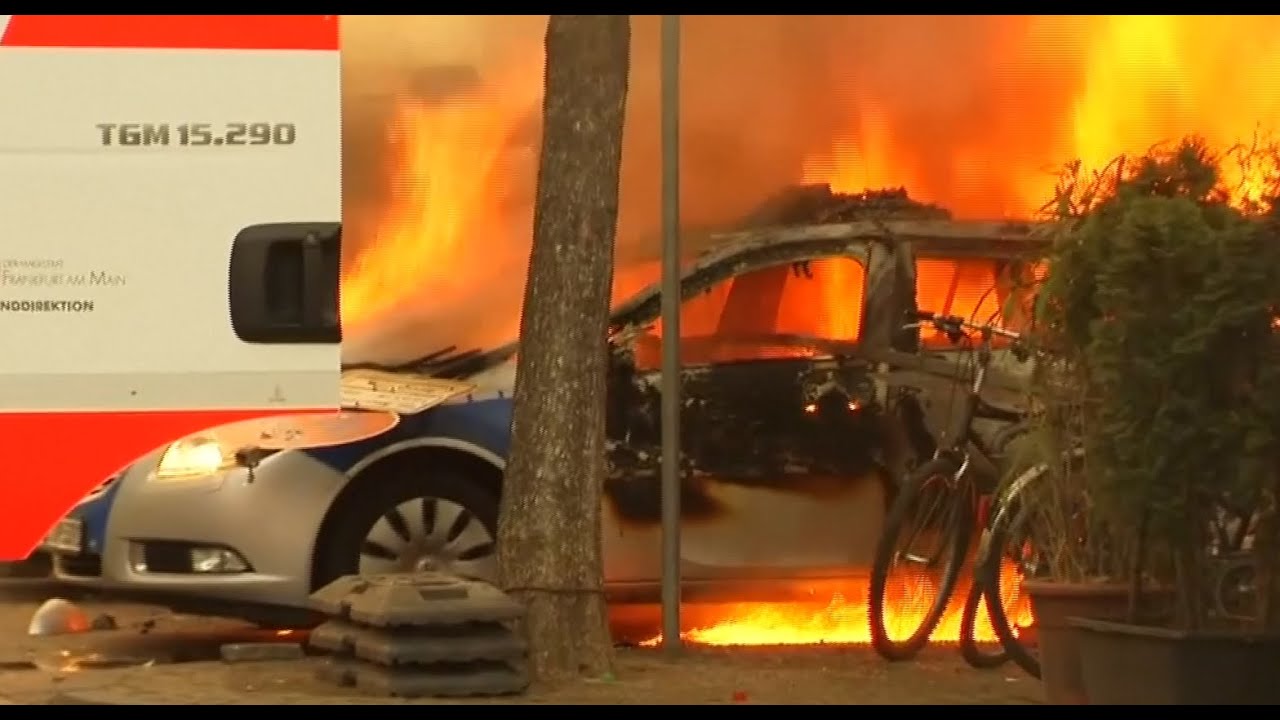 Police cars set on fire and Frankfurt roads blocked by anti-capitalist protesters