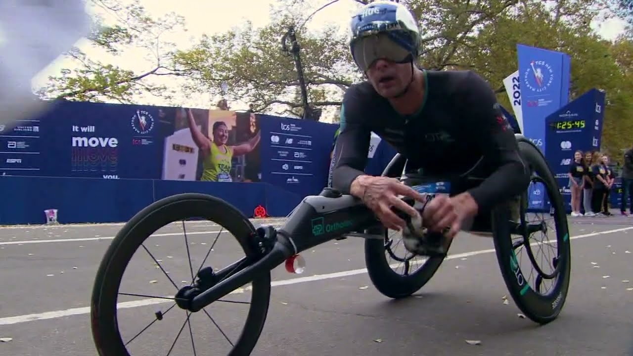 Hug breaks wheelchair course record, wins 5th NYC Marathon