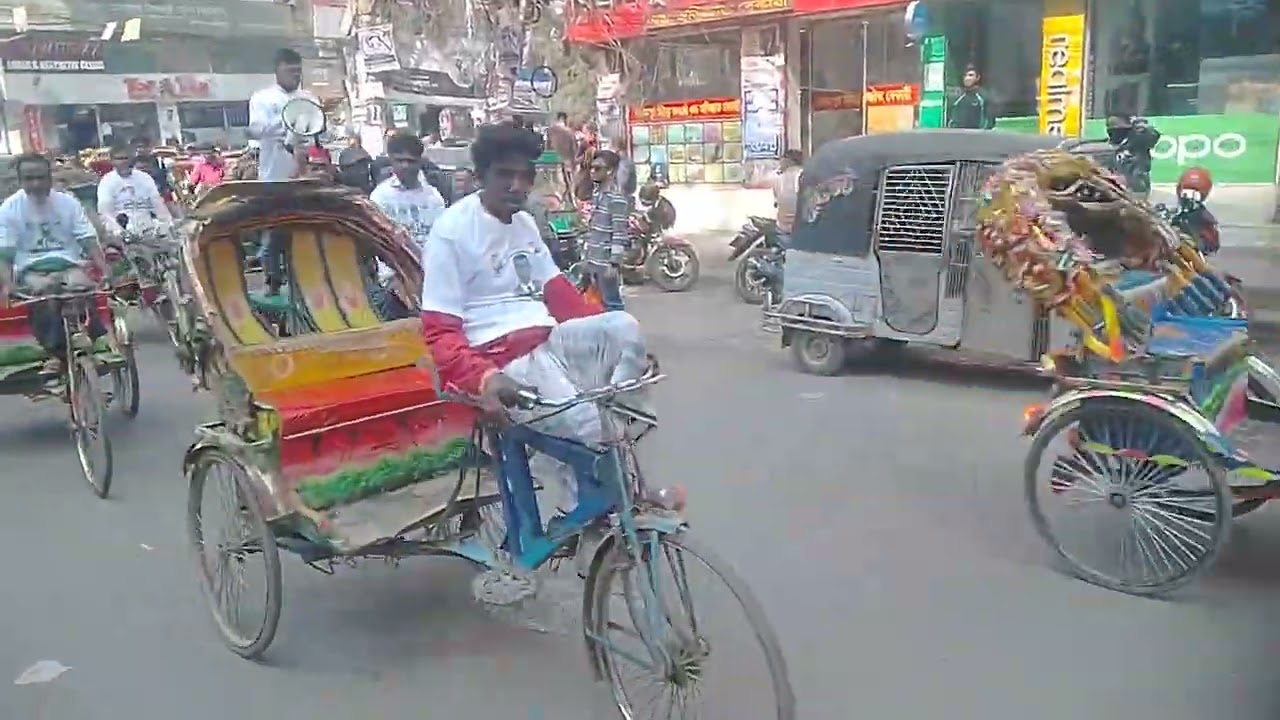 ঢাকা 18 আসনের নির্বাচনের প্রচার প্রচারণায় বাংলাদেশ জাতীয়তাবাদী রিক্সা ভ্যান অটোচালক দল ঢাকা  উত্তর