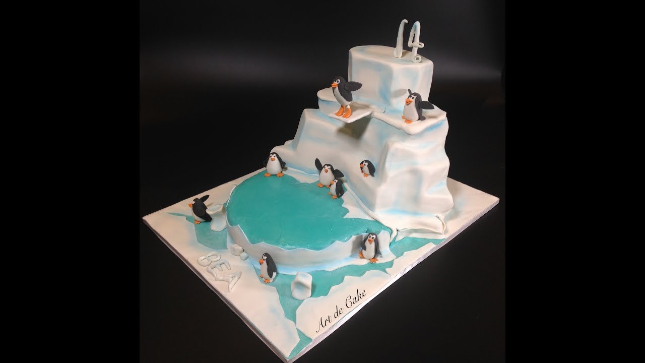 Winter wonderland diving penguin cake by Art de Cake