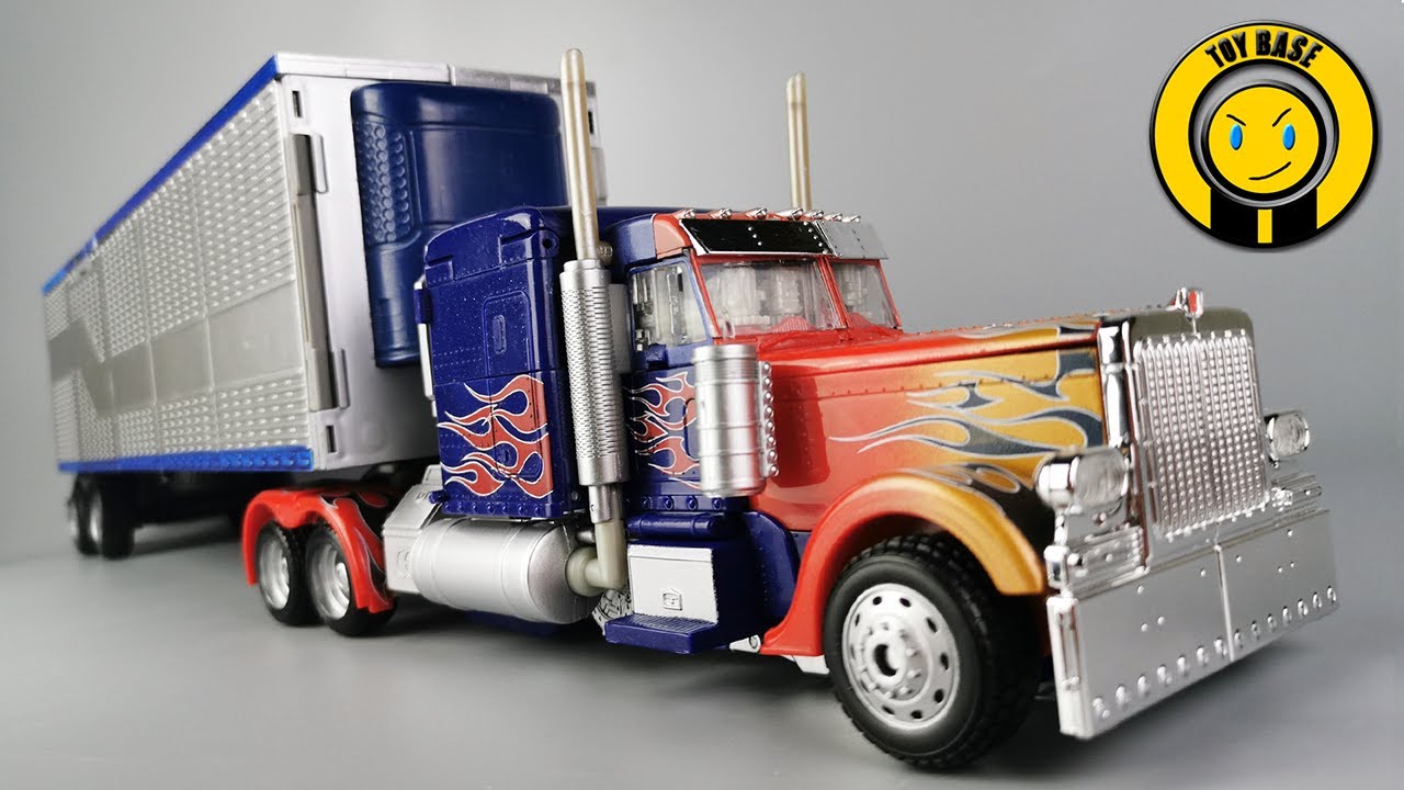 Classic Optimus Prime Comparison Transformers Movie Series 2009 Leader Class RA01 & RA24 Robot Toys