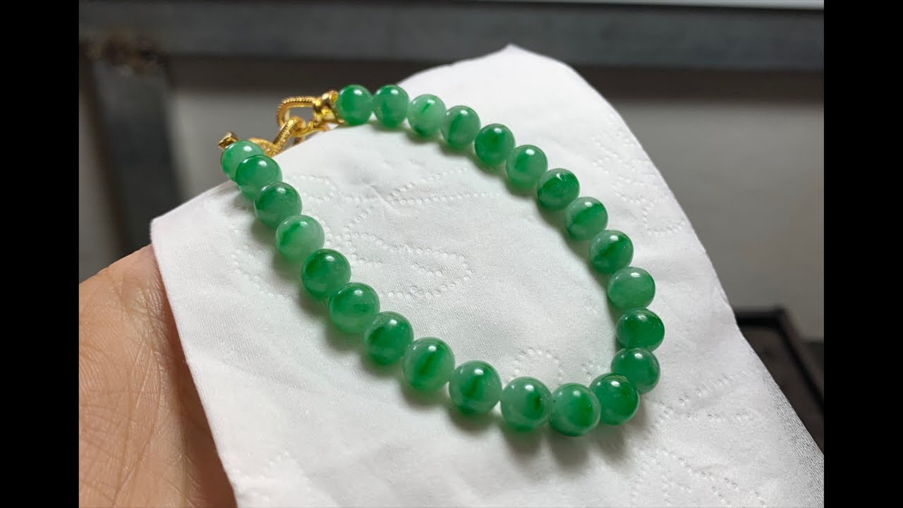 Analyze the rarity and potential resale value of unique jadeite rough stones from Myanmar