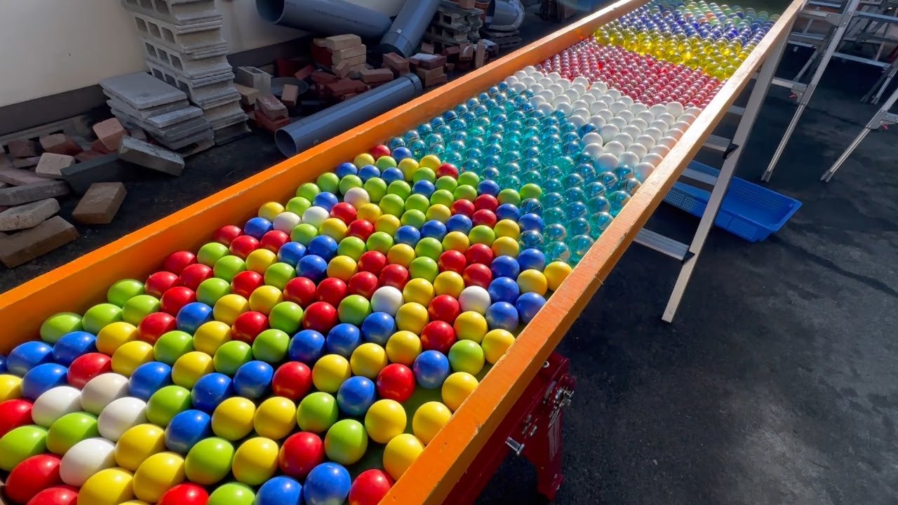 Rainbow colored rolling balls compilation