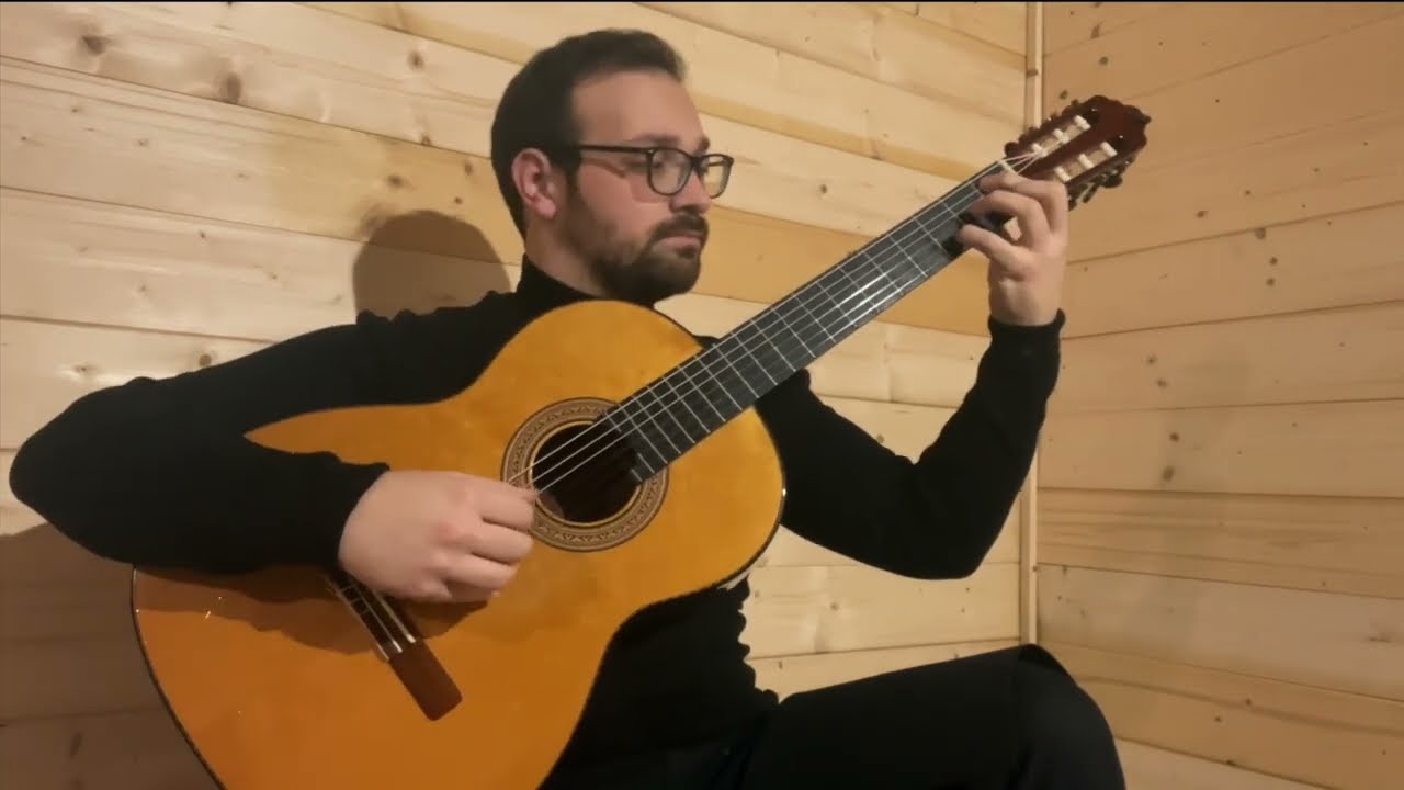 Michele Di Filippo plays his piece  for guitar “Breaths”